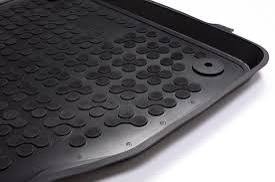 Dettaglio bordo rialzato del tappeto in gomma 3D